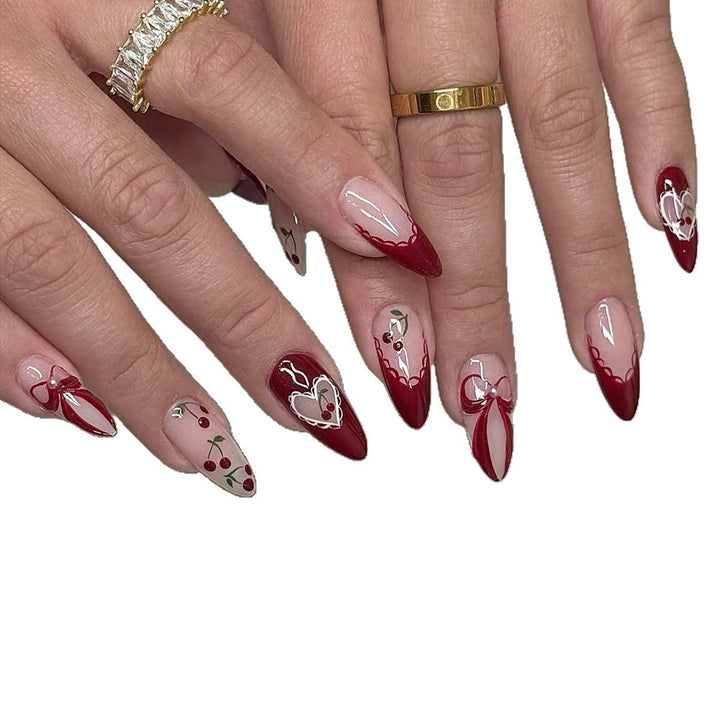 Creative nail set with romantic heart and bow accents Kalsten