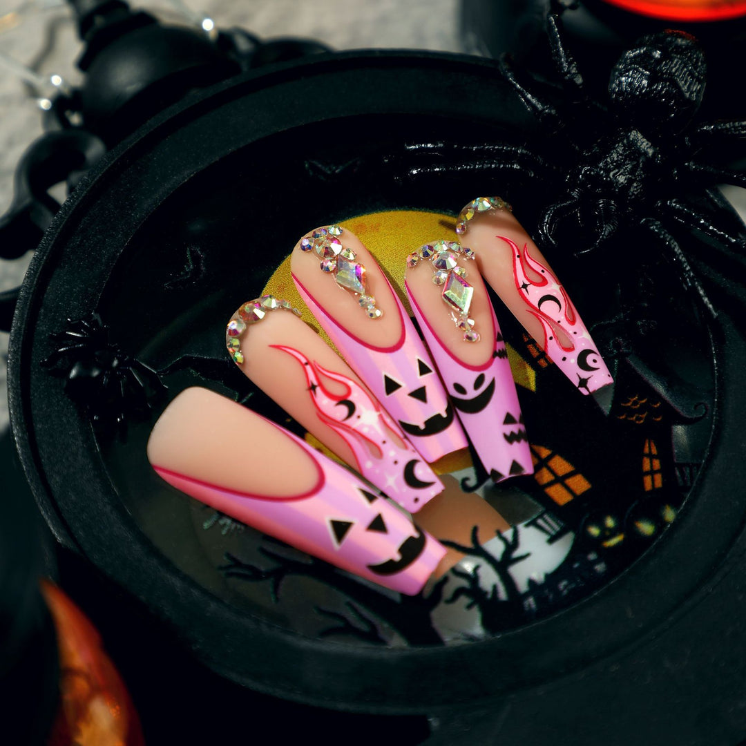 Artificial nail art with festive design and glitter variations Kalsten