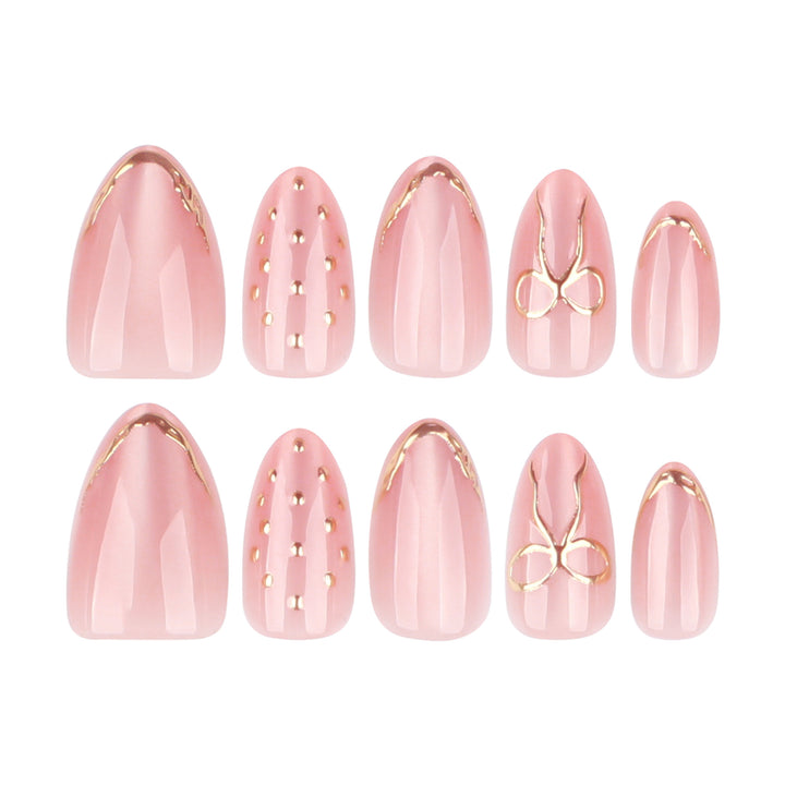 Artful nail extensions with elegant golden accents Kalsten
