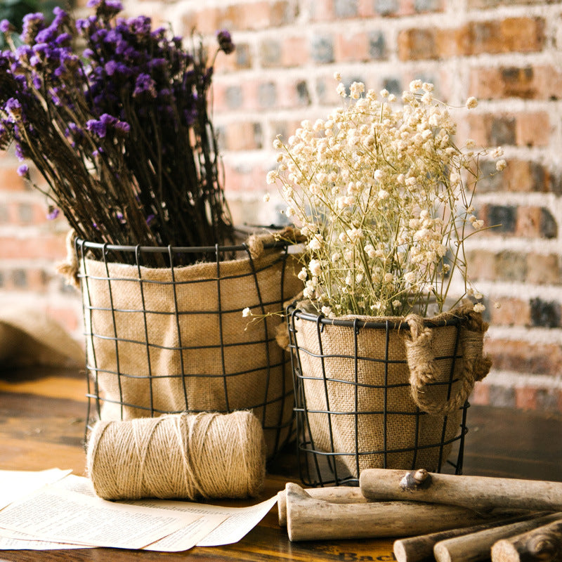 Decorative storage basket made of wire and linen Kalsten