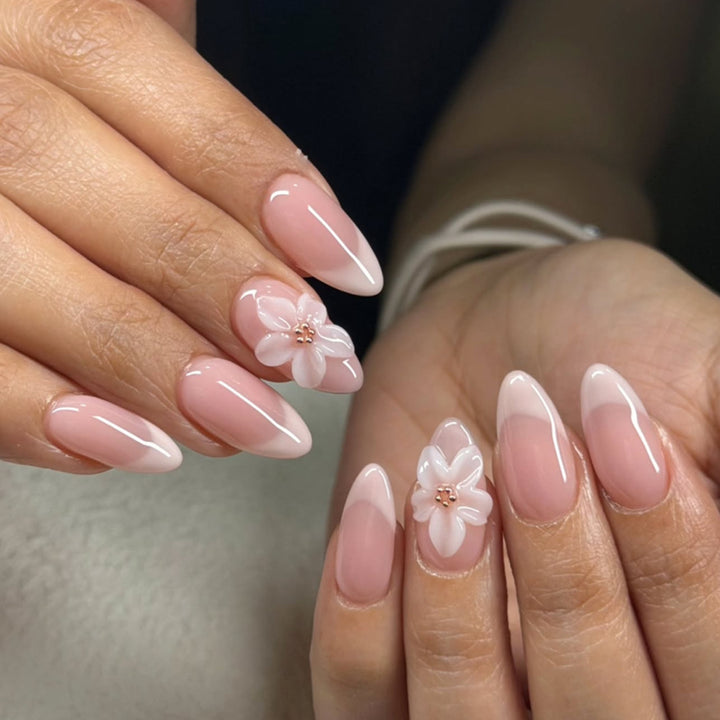 Artistic acrylic nails with elegant flower designs Kalsten