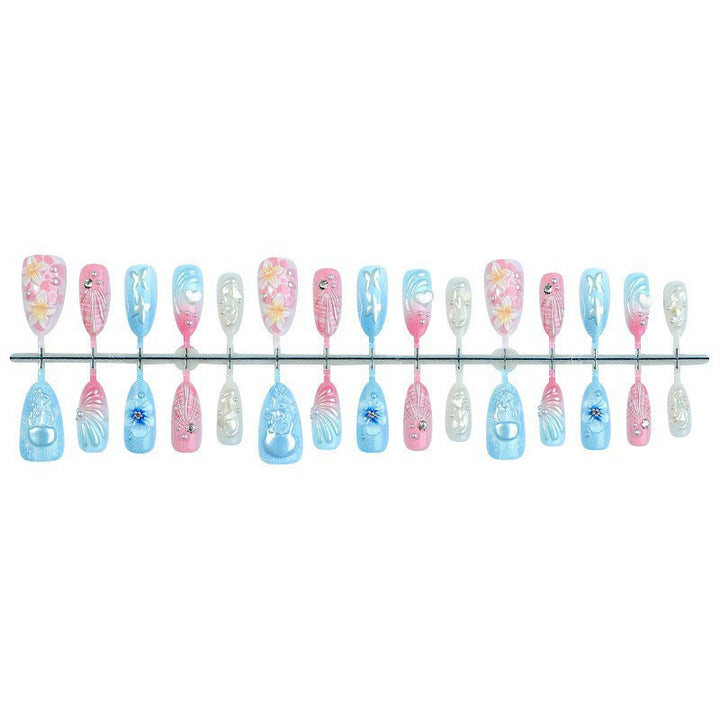 Artificial nail set with maritime motifs and colorful accents Kalsten