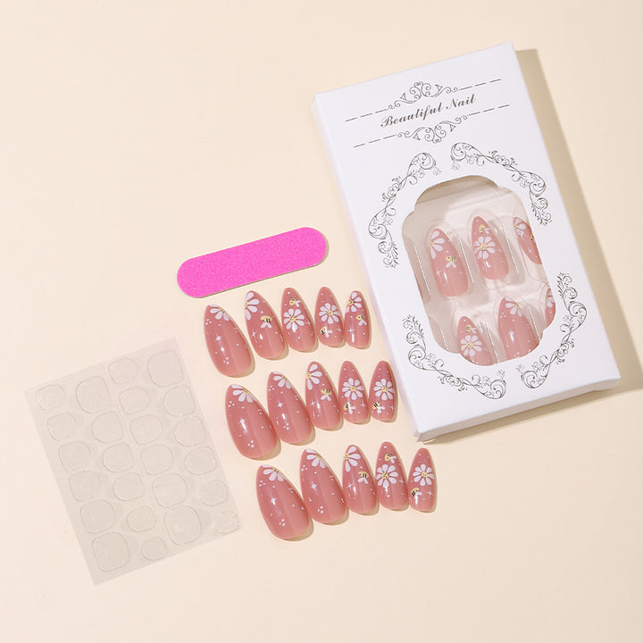 Artificial nails set with elegant flowers and glitter accents Kalsten