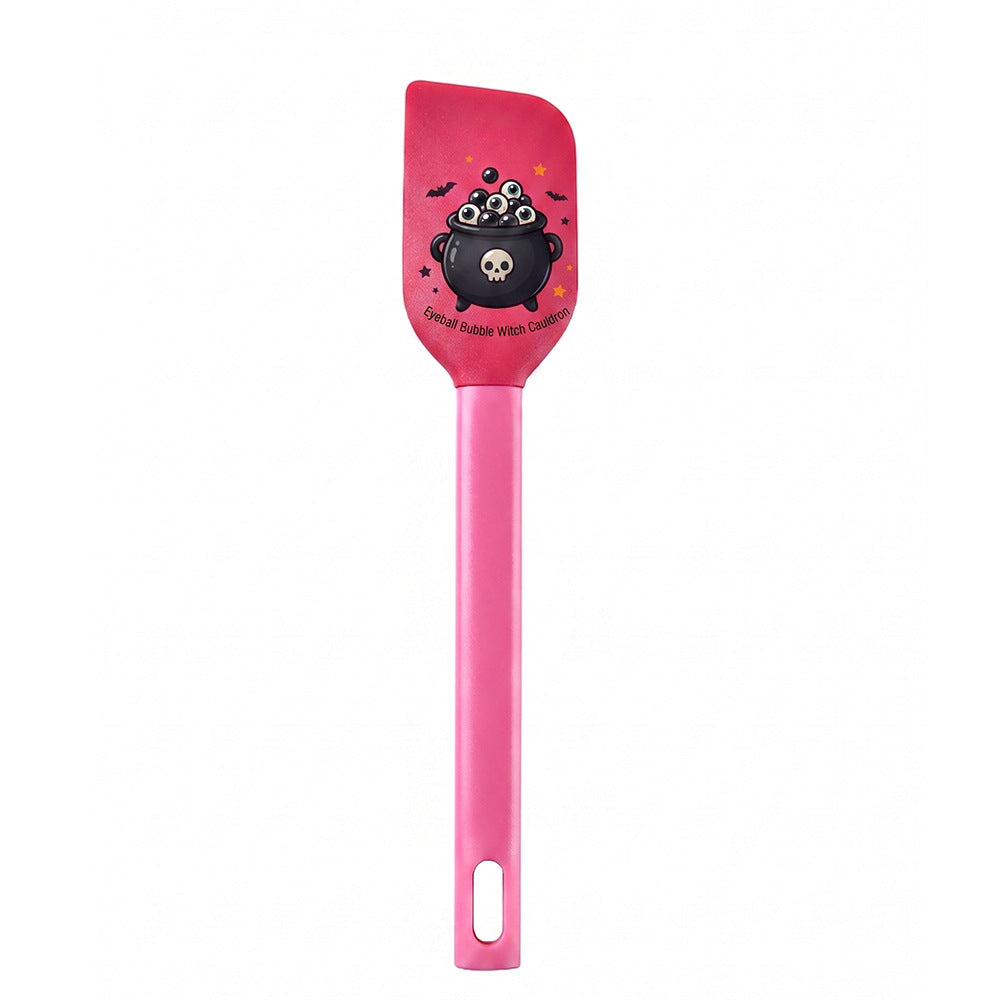 Silicone kitchen spatula with flexible scraper and child-friendly witch motif