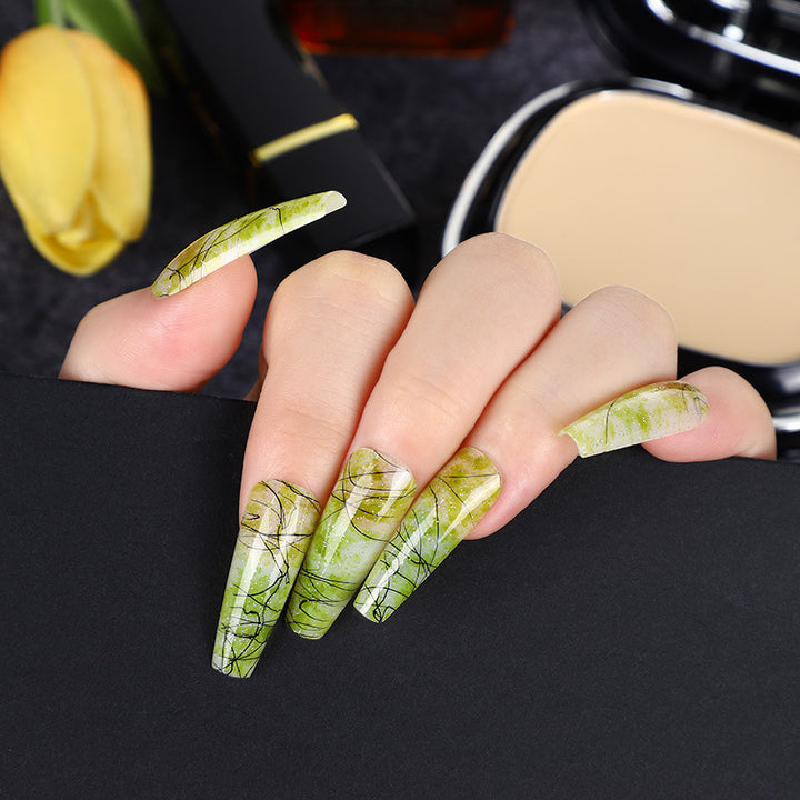 Creative nail art with blood splatter design Kalsten