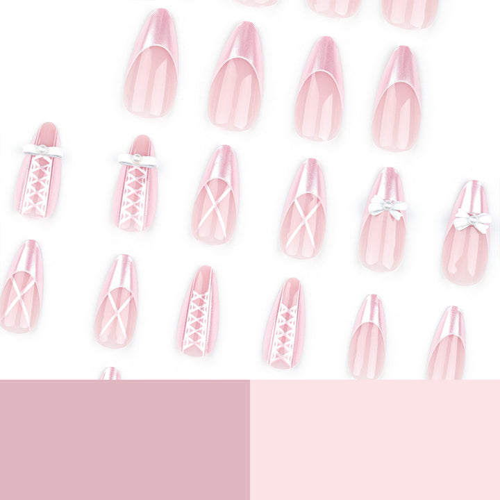 Artistic stiletto nails with elegant pearl and bow accents Kalsten