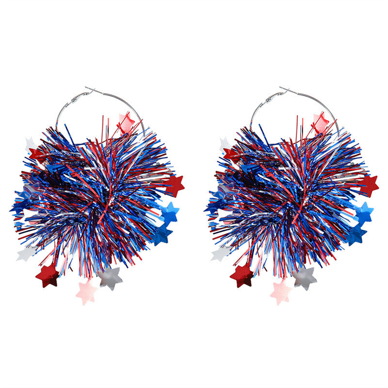 Women with eye-catching pompom hoops with lametta tassels and lightweight wire closure Kalsten