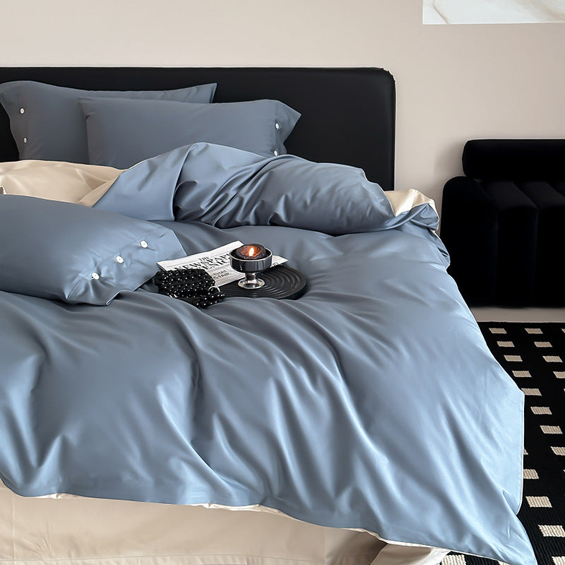 Reversible bedding set made of fine cotton satin with button placket and contrasting back
