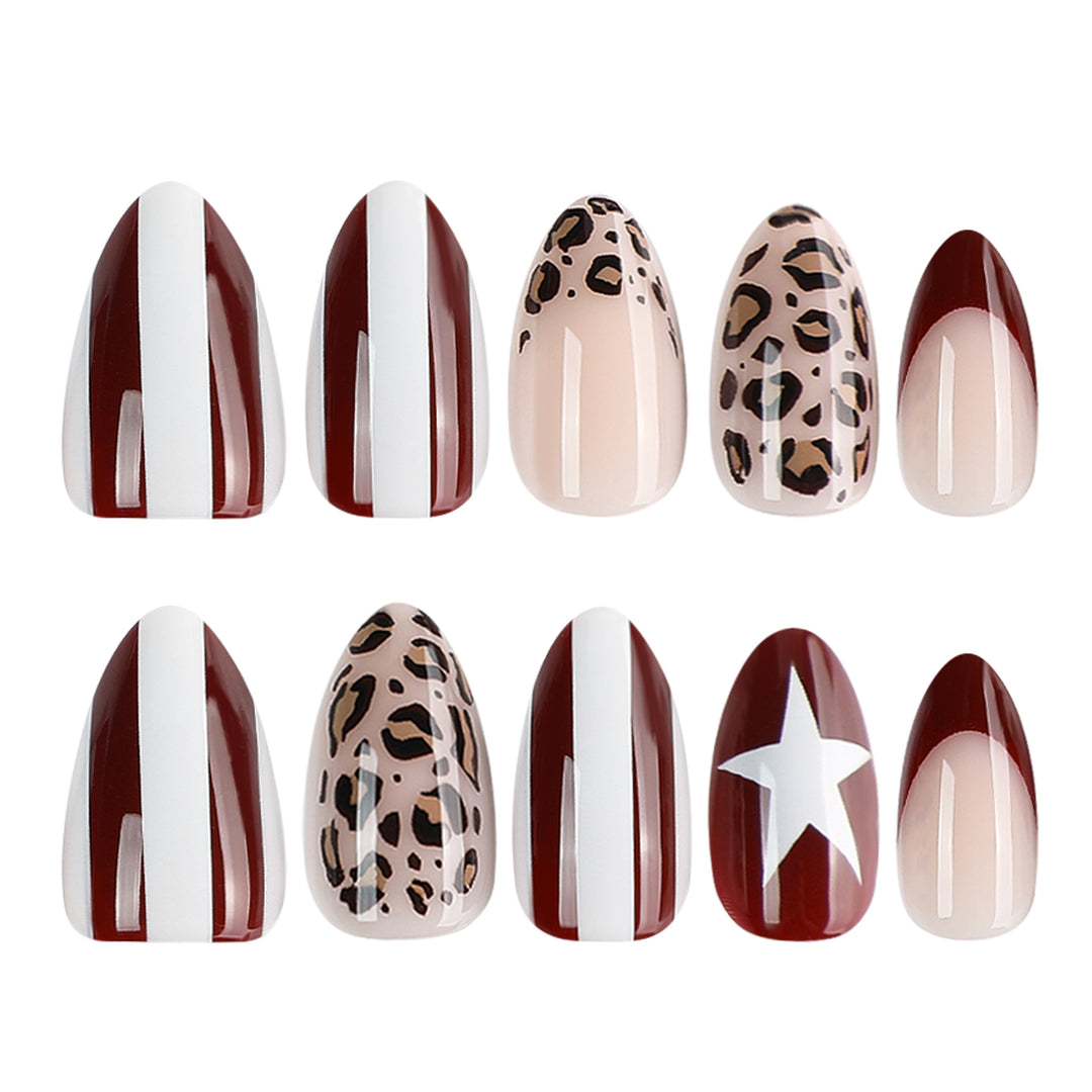 Artful stiletto nails with leopard pattern and elegant glitter decoration Kalsten