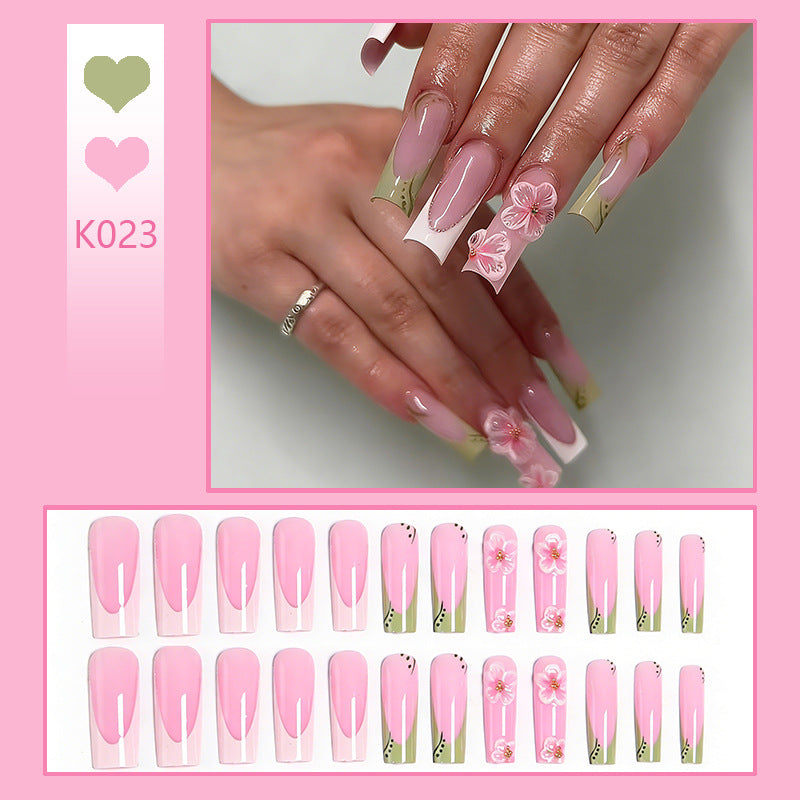Artful nail tips with floral embellishments Kalsten