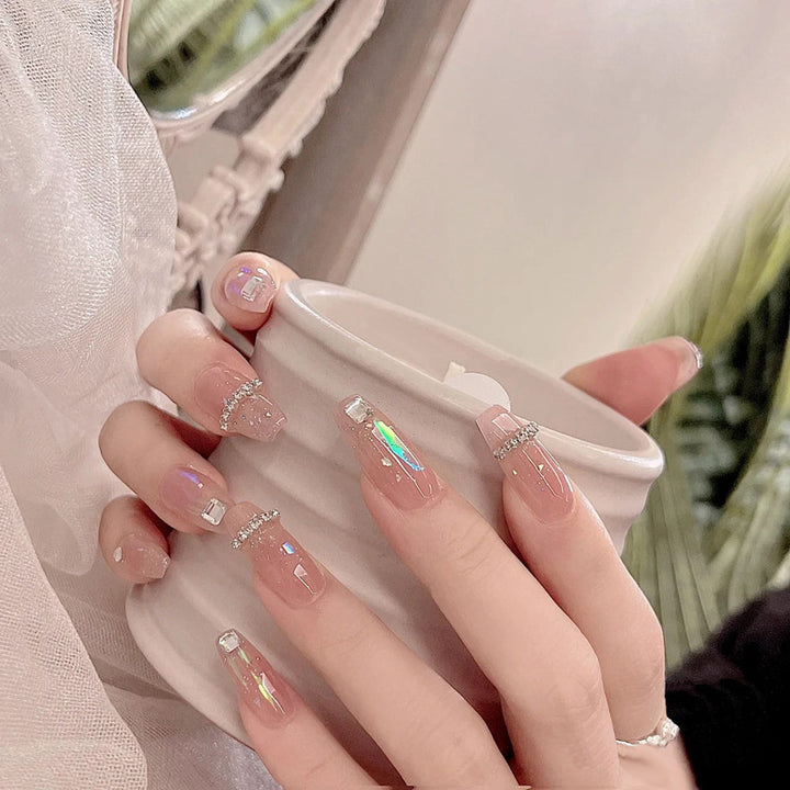 Acrylic nail set with glamorous rhinestone and glitter elements Kalsten