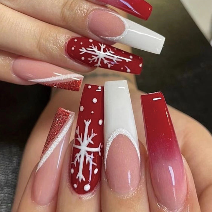 Artful Christmas nail extensions with elegant glitter and snowflake design Kalsten