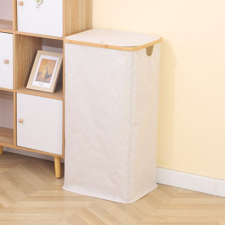 Stylish laundry basket with wooden lid Kalsten