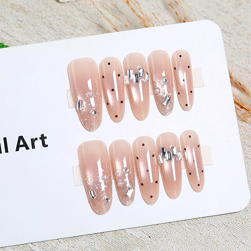 Artificial nail set with sparkling glitter and elegant jewelry details Kalsten