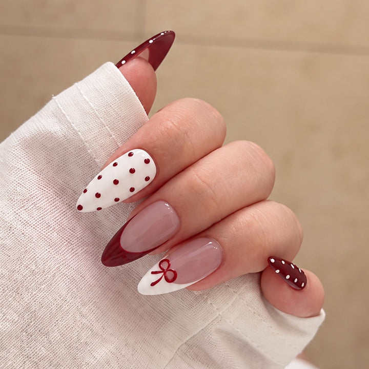 Nail set with elegant bows and polka dots Kalsten