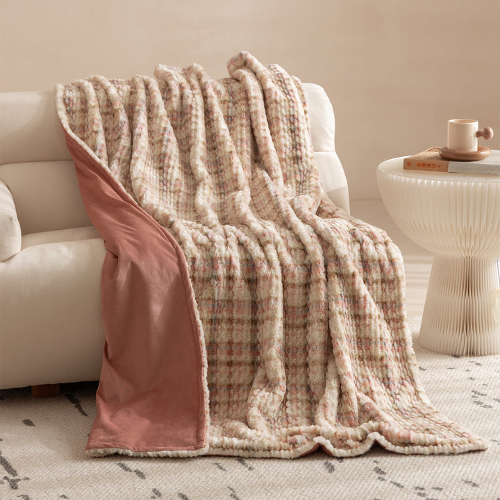 Cozy blanket made of luxurious synthetic fur with wavy texture and soft microfiber back Kalsten
