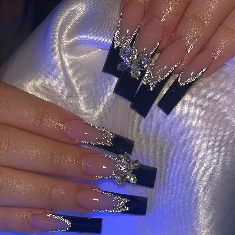 Glamorous artificial nails with rhinestone and butterfly elements Kalsten