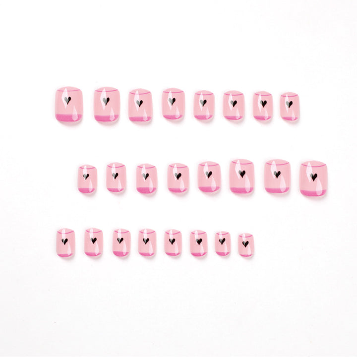 Creative Nail Art with Heart Design and Glitter Accents Kalsten