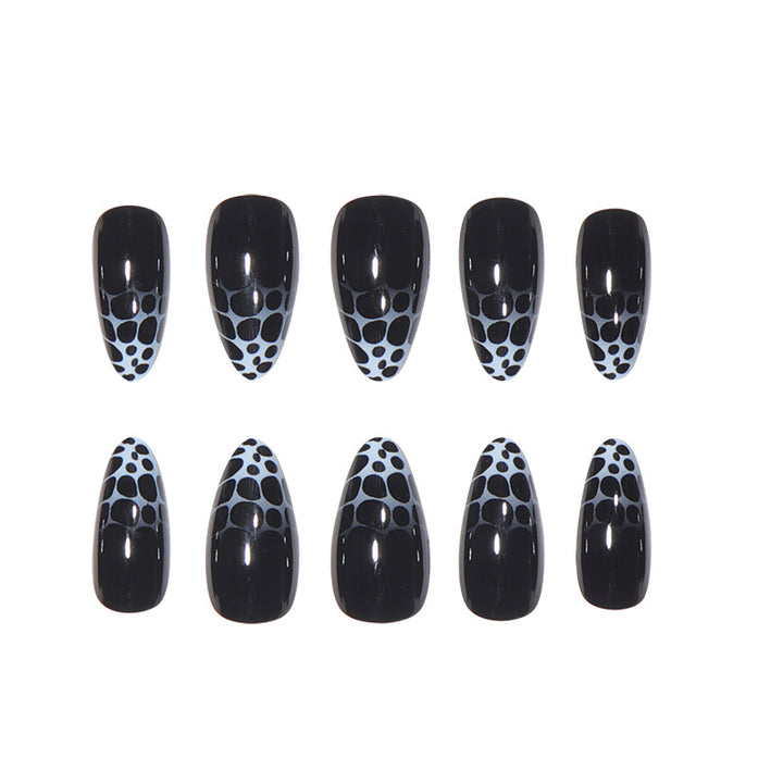 Stiletto Nail Art with Abstract Patterns Kalsten