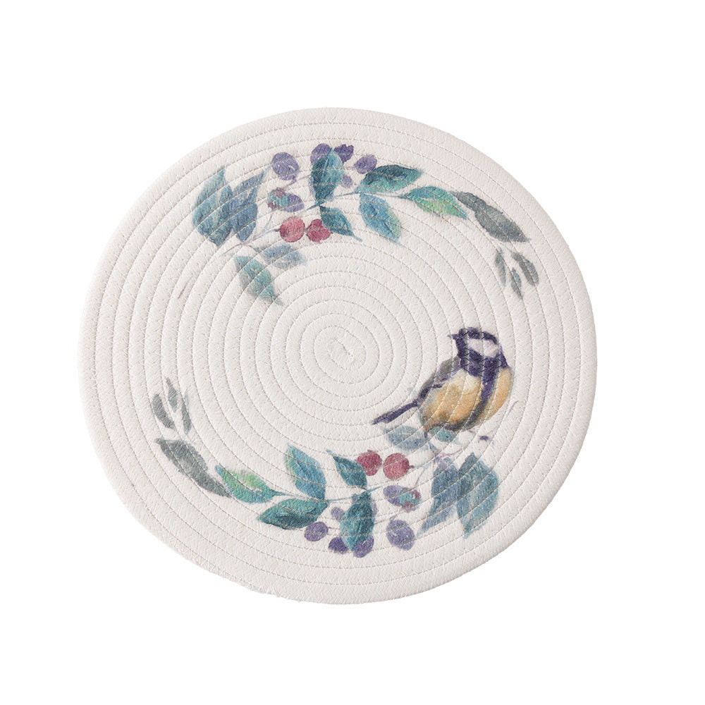 Round placemat made of woven cotton with a cute rhinoceros illustration and floral wreath Kalsten