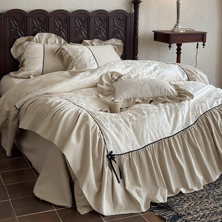 Romantic bed set with frill, jacquard relief and decorative ribbon