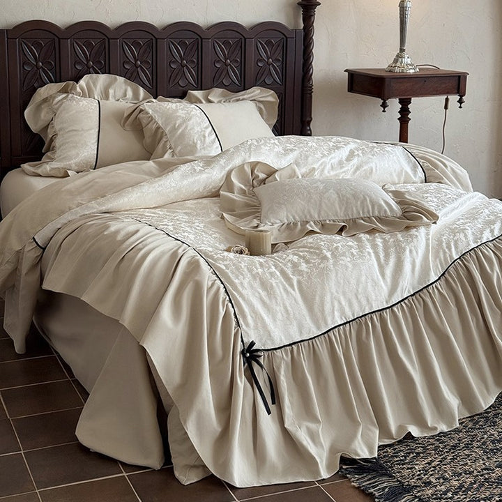 Romantic bed set with frill, jacquard relief and decorative ribbon