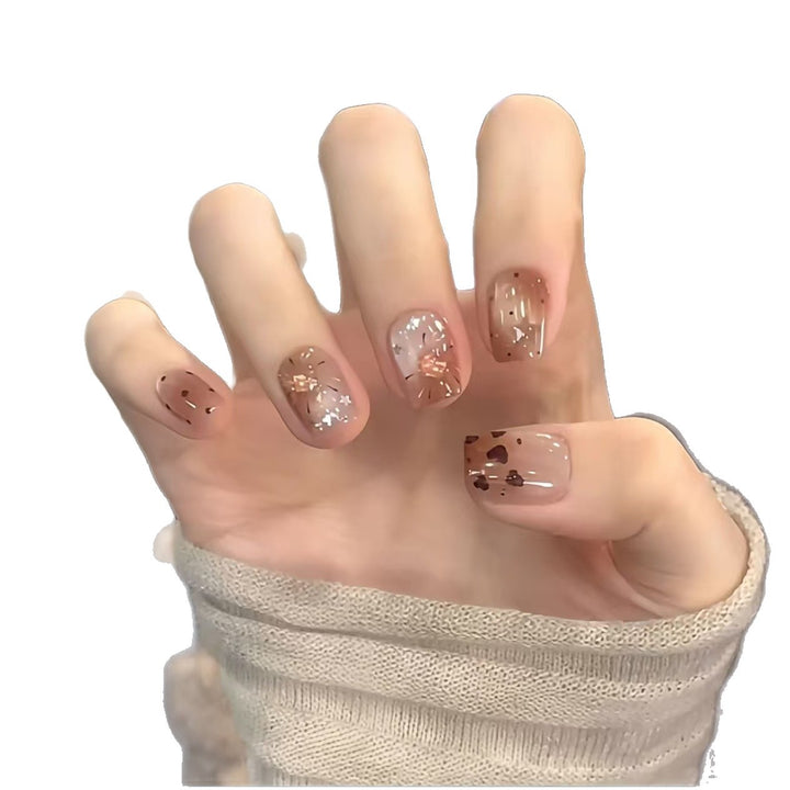 Artistic Nail Art Extensions with Metallic Accents