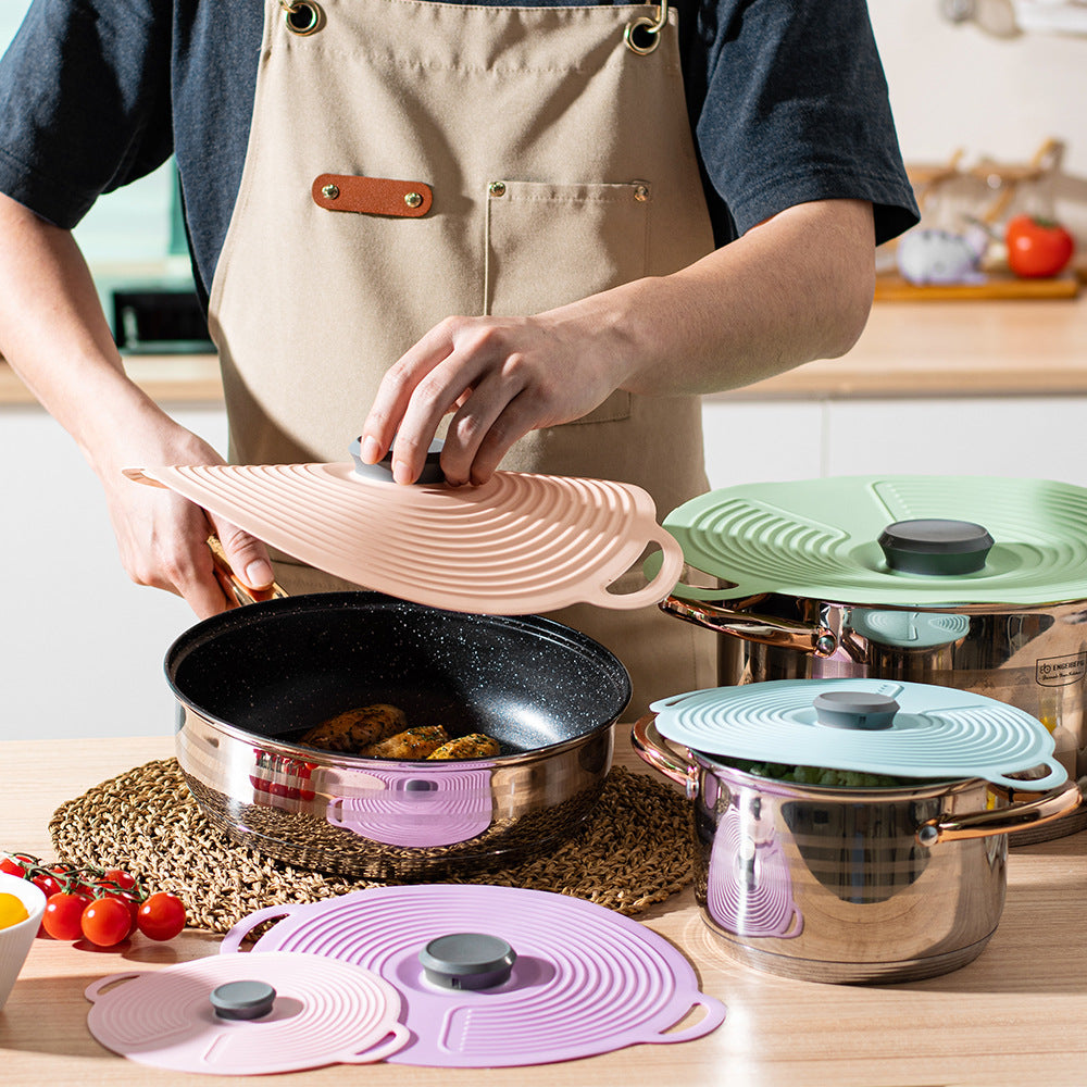 Silicone cooking lid with multifunctional steam valve Kalsten