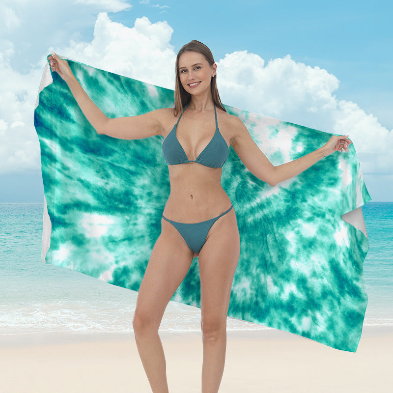 Beach towel with vibrant tropical plant motif Kalsten