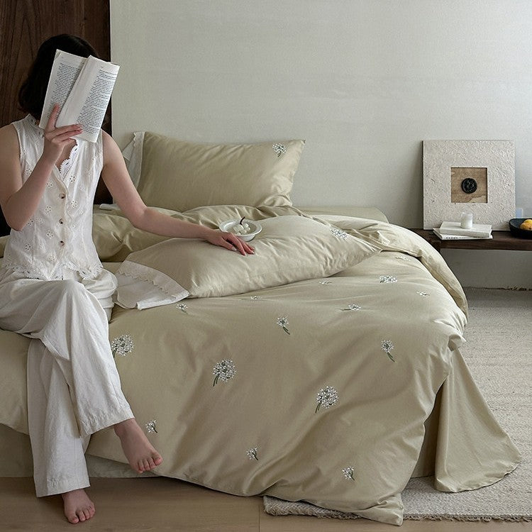 Embroidered bed linen set made of cotton satin with subtle scattered flower embroidery
