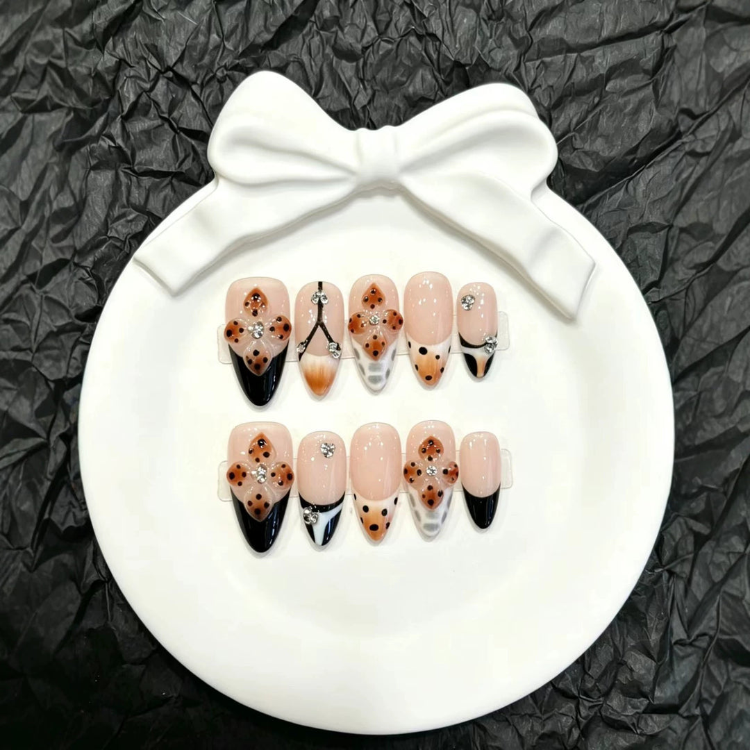 Artistic Press-On Nail Set with Floral and Gem Accents