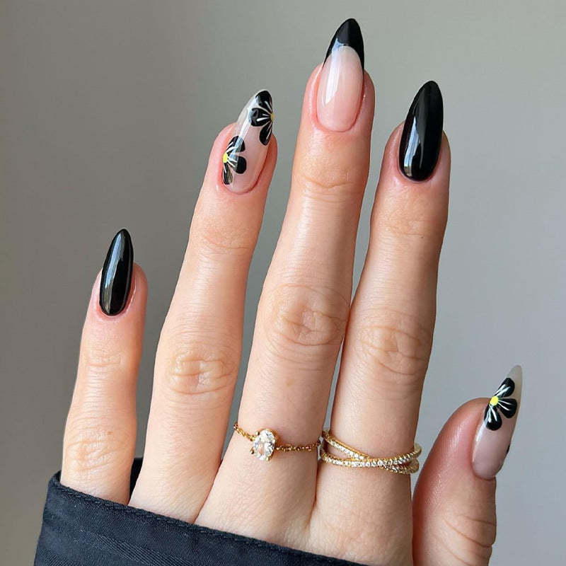 Elegant nail tips with floral accents Kalsten