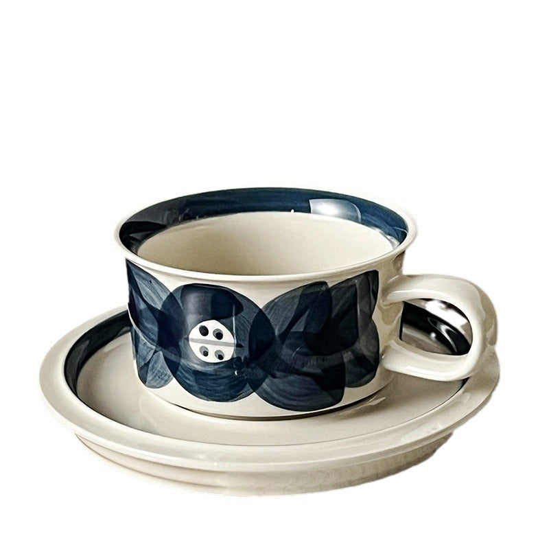 Ceramic cup set with saucer and modern floral print
