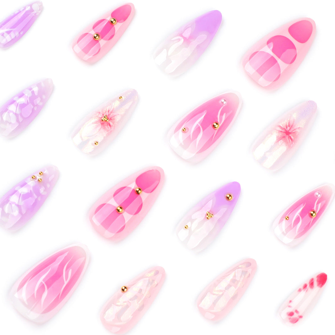 Artful Nail Extensions with Floral Patterns and Rhinestone Embellishments Kalsten