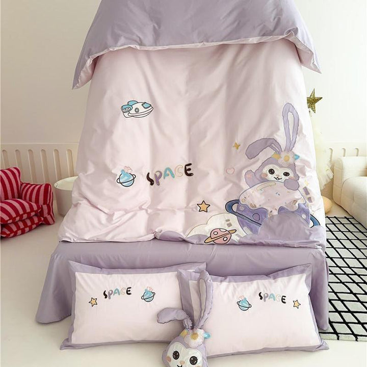 Children's bedding set with playful space bunny design