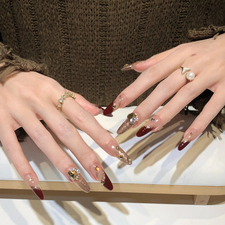 Acrylic nail set with elegant glitter design and exclusive embellishments Kalsten