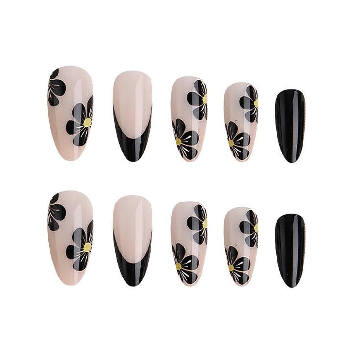 Elegant nail tips with floral accents Kalsten