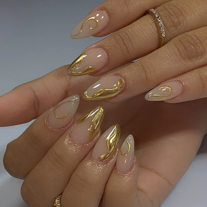 Artistic Stiletto Nails with Elegant Gold Accents Kalsten
