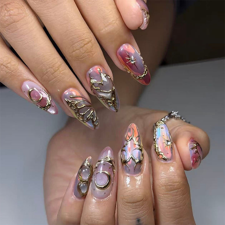 Elegant and creative artificial nails with metallic accents Kalsten