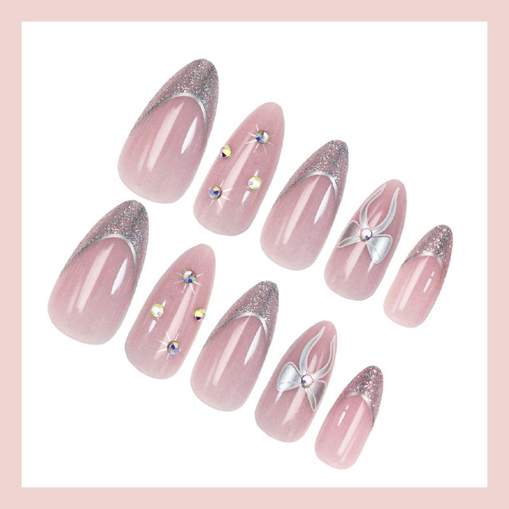 Artificial nail set with glamorous glitter and flower accents Kalsten