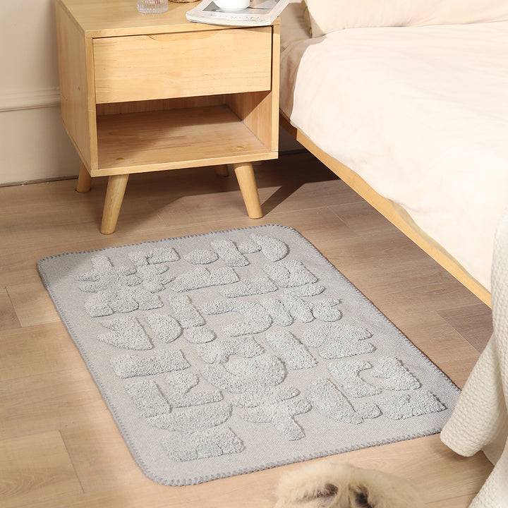 Luxurious organic cotton bath mat with relief pile structure Kalsten