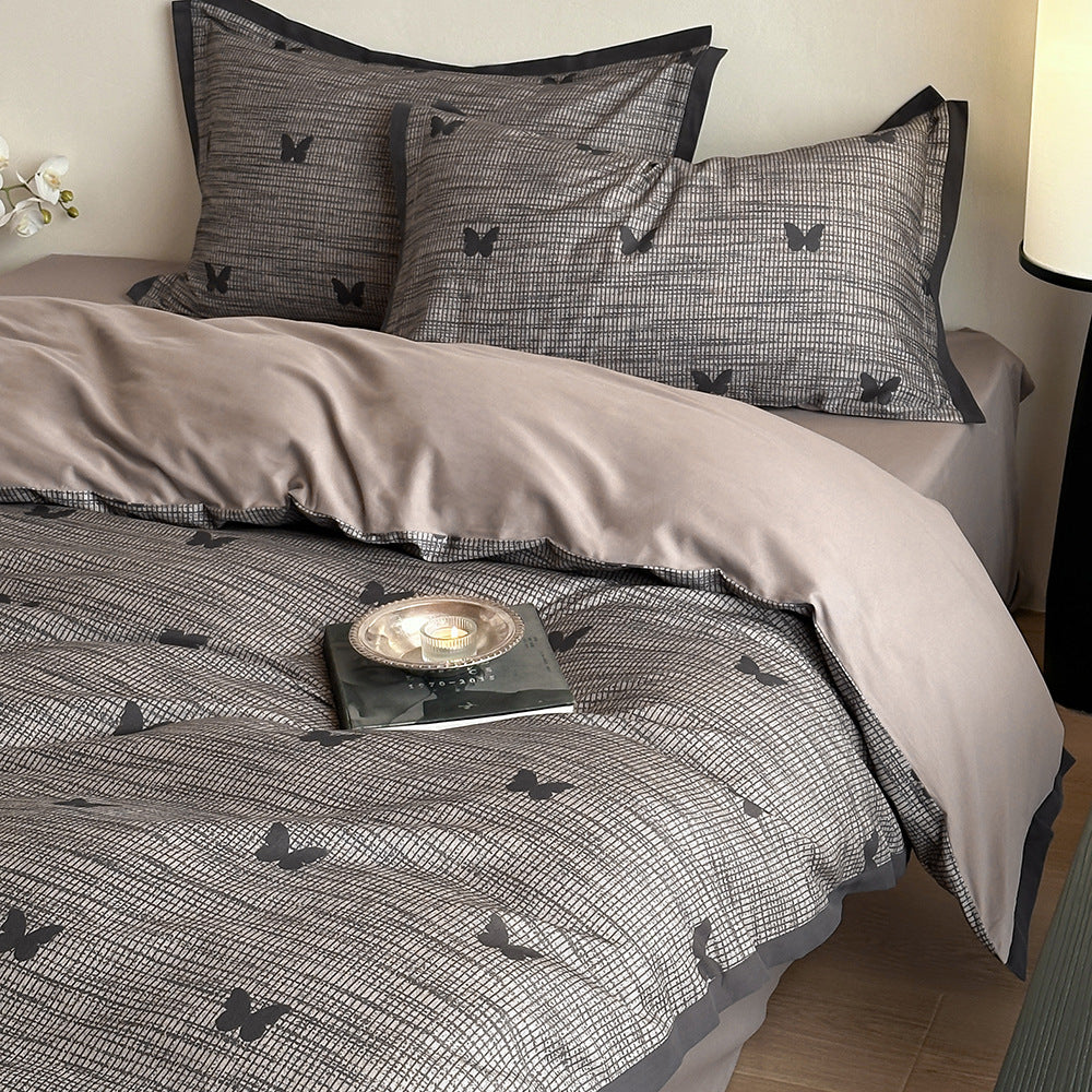 Duvet cover set with fine check pattern and subtle floral relief made of cotton blend