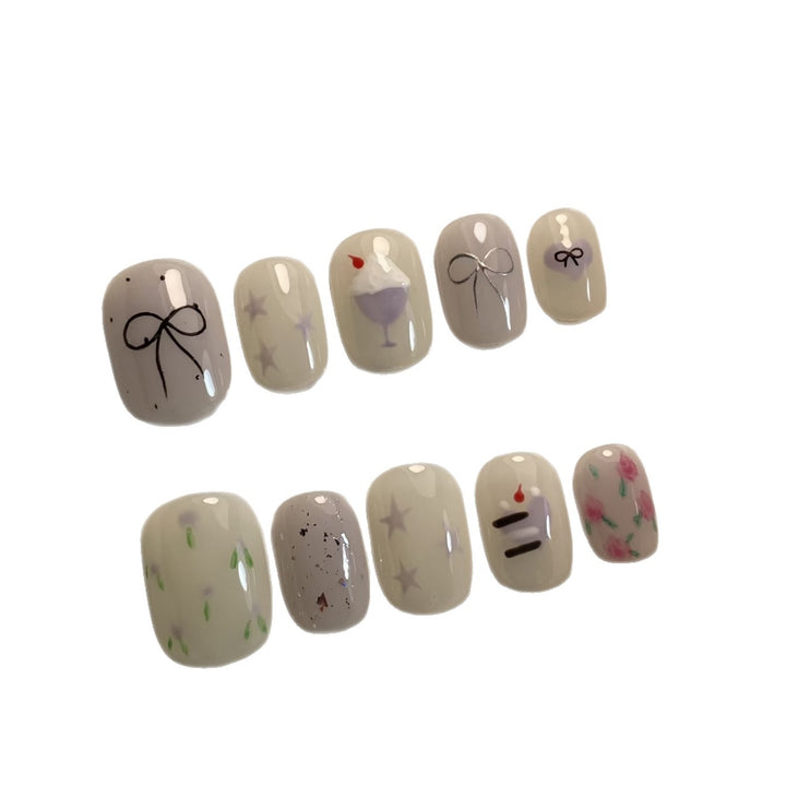 Artistic Press-On Nail Art Set with Cute Cake and Ribbon Designs