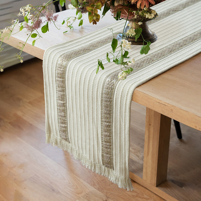 Woven table runner made of cotton blend with textured waffle weave and contrasting center strip Kalsten