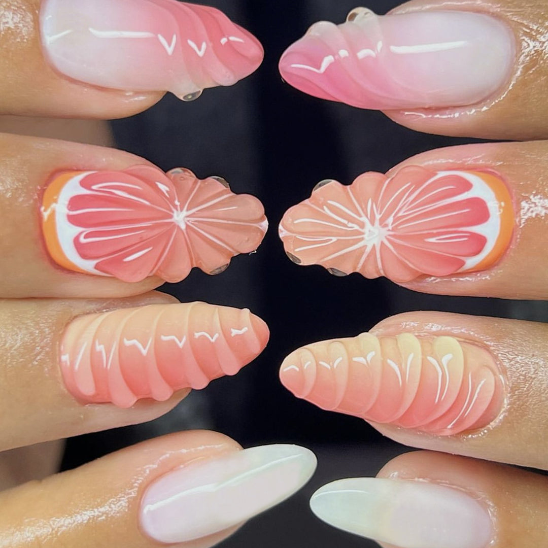 Creative nail set with subtle ombre effects and elegant decorative elements Kalsten