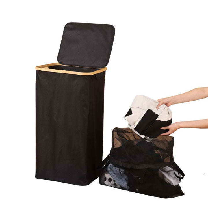 Elegant laundry container with practical lid and carrying system Kalsten