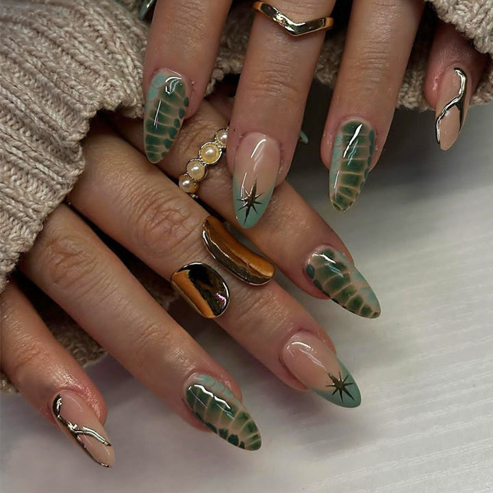 Artificial nail set with creative leaf design and elegant glitter accents Kalsten