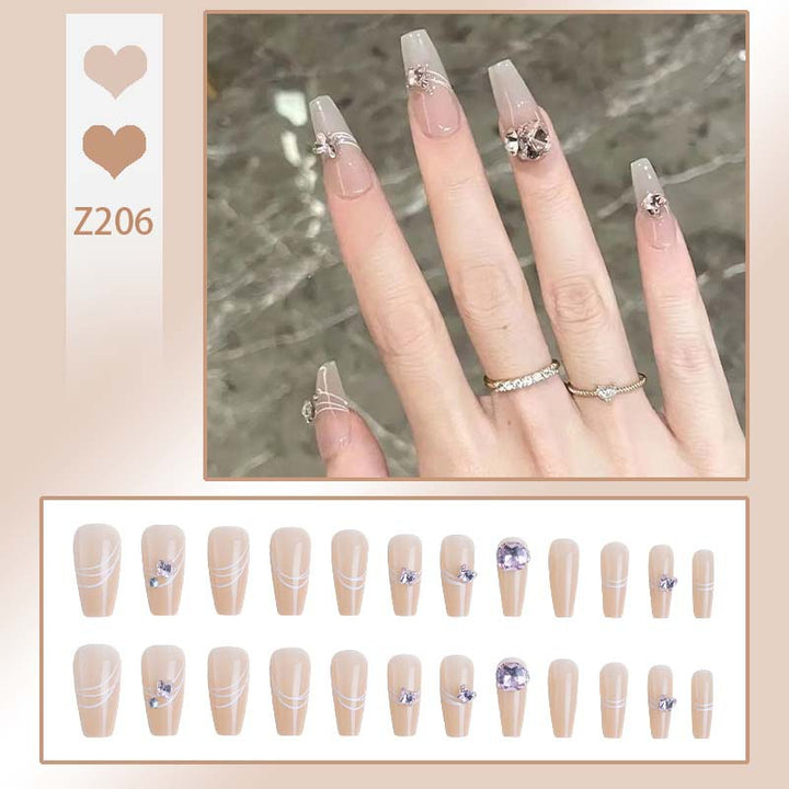Art nail set with filigree decorations and glamorous accents Kalsten