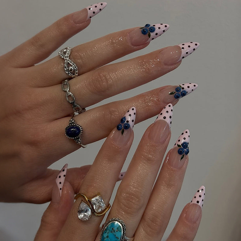 Acrylic nail set with stylish dots and floral embellishments Kalsten