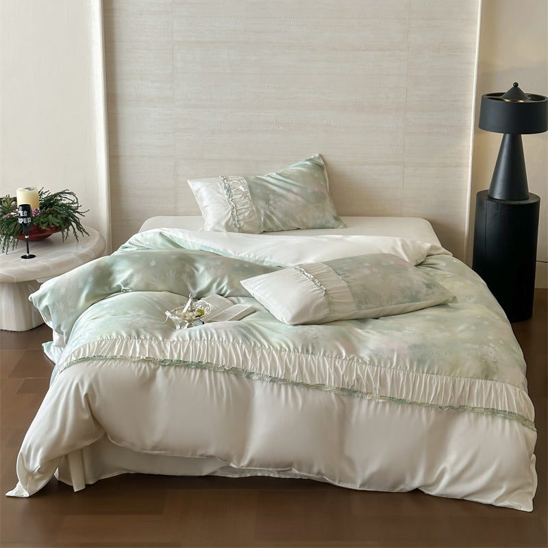 Extra soft satin duvet cover set with voluminous ruffle, subtle watercolor leaf print and concealed closure